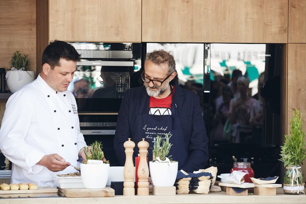 Massimo Bottura participating in the container kitchen
